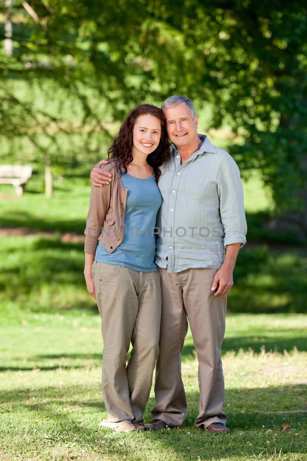 Father with his daughter looking at the camera