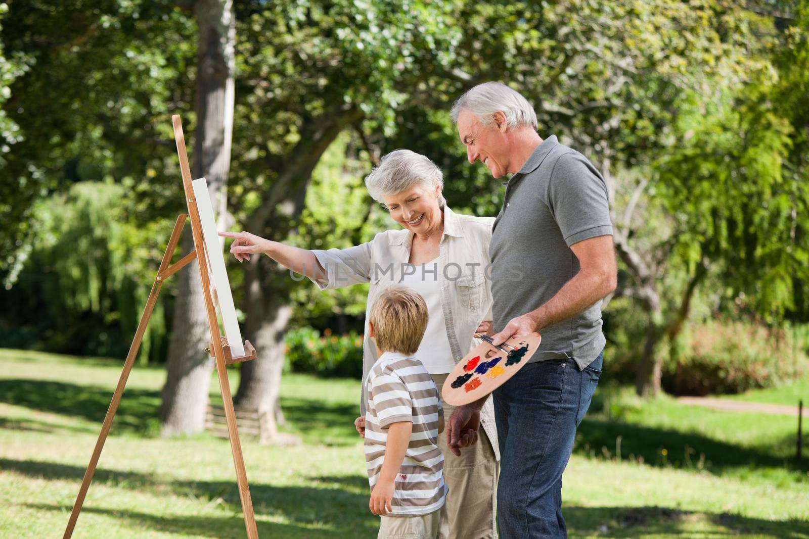 Family painting in the garden by Wavebreakmedia