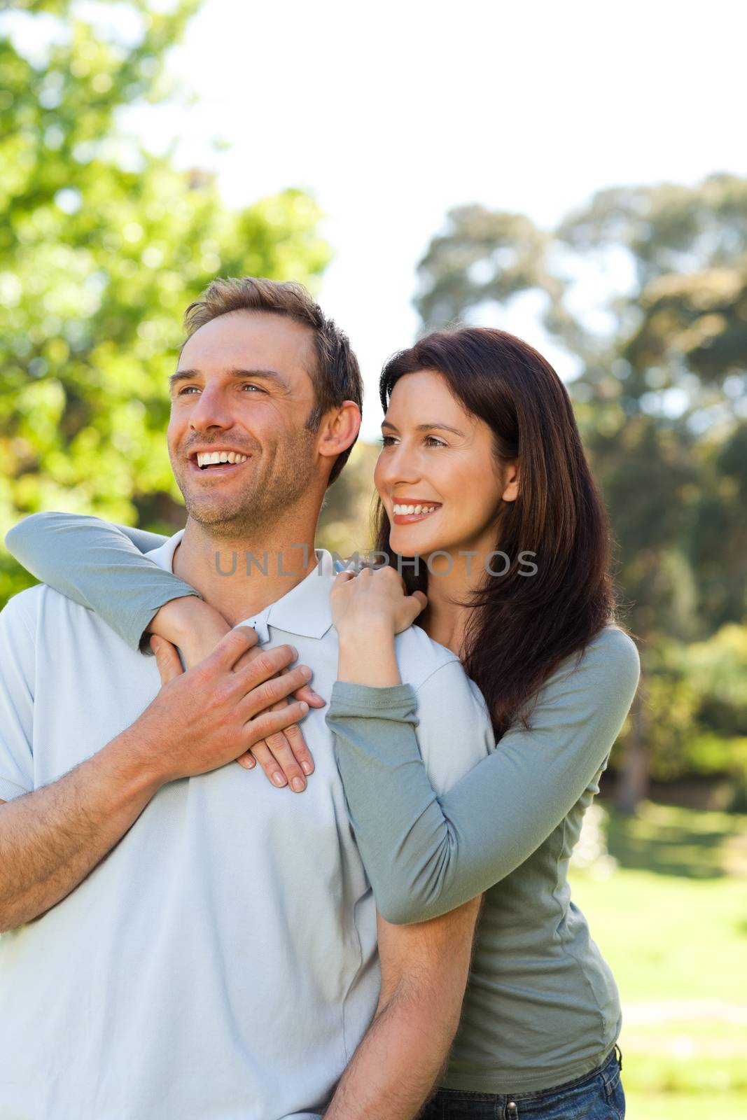 Beautiful couple in the park by Wavebreakmedia