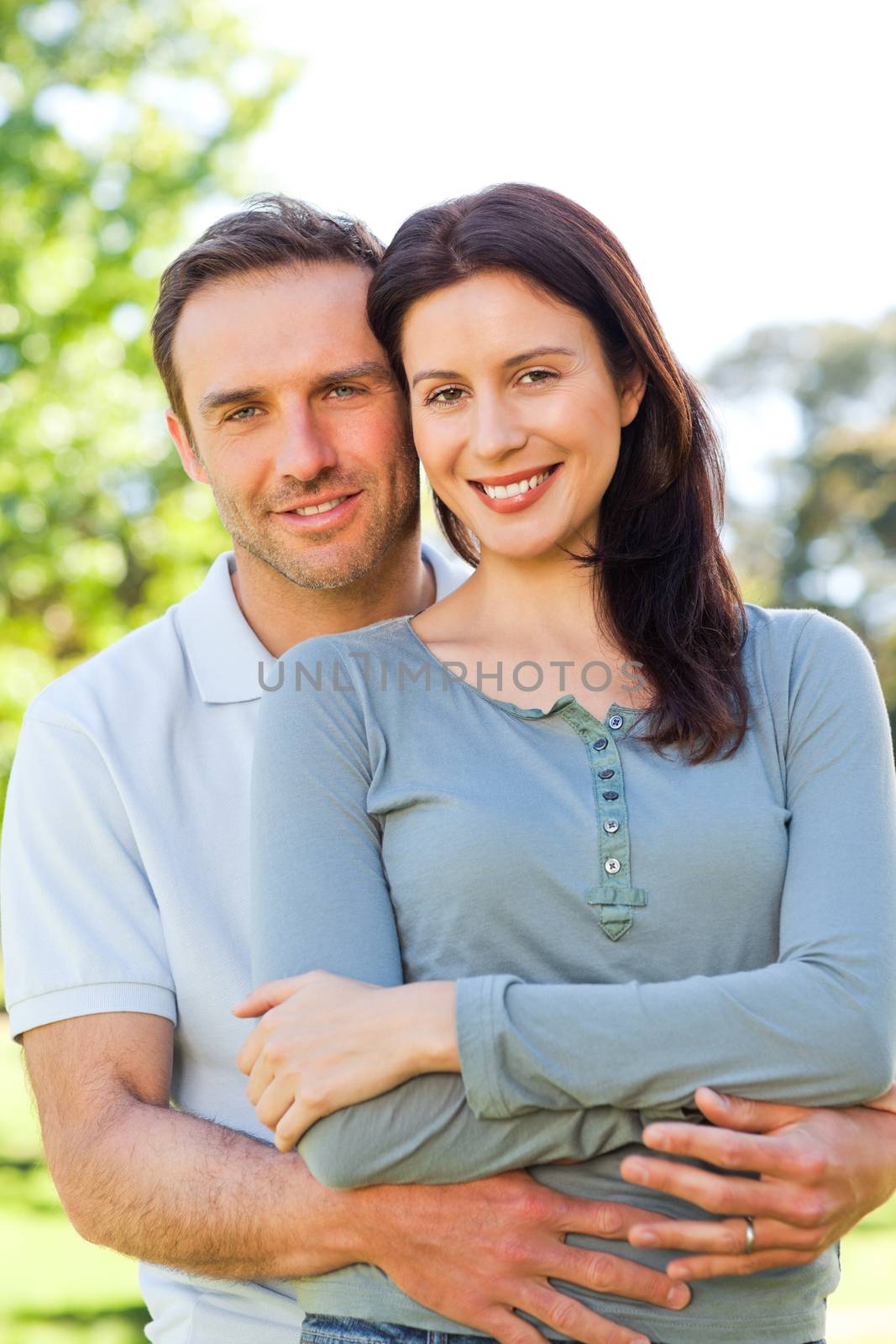 Lovely couple in the park by Wavebreakmedia