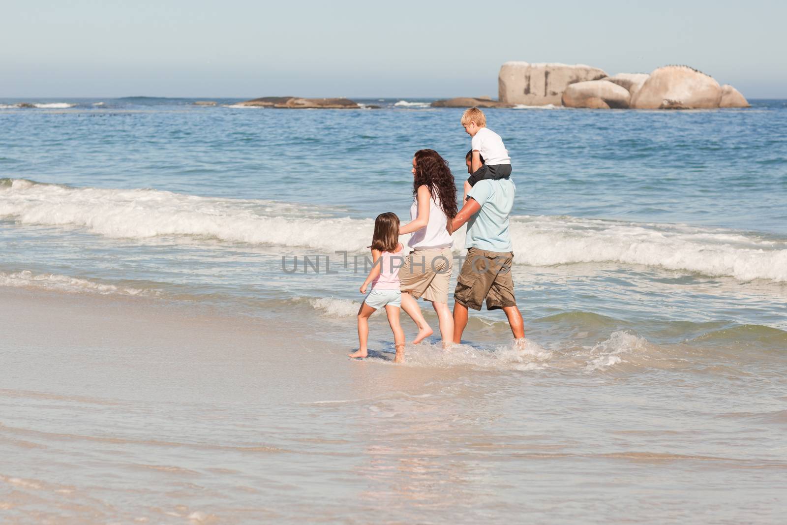 Joyful family at the beach