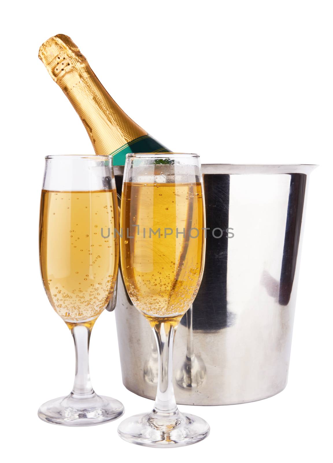 Champagne bottle in cooler and two champagne glasses 