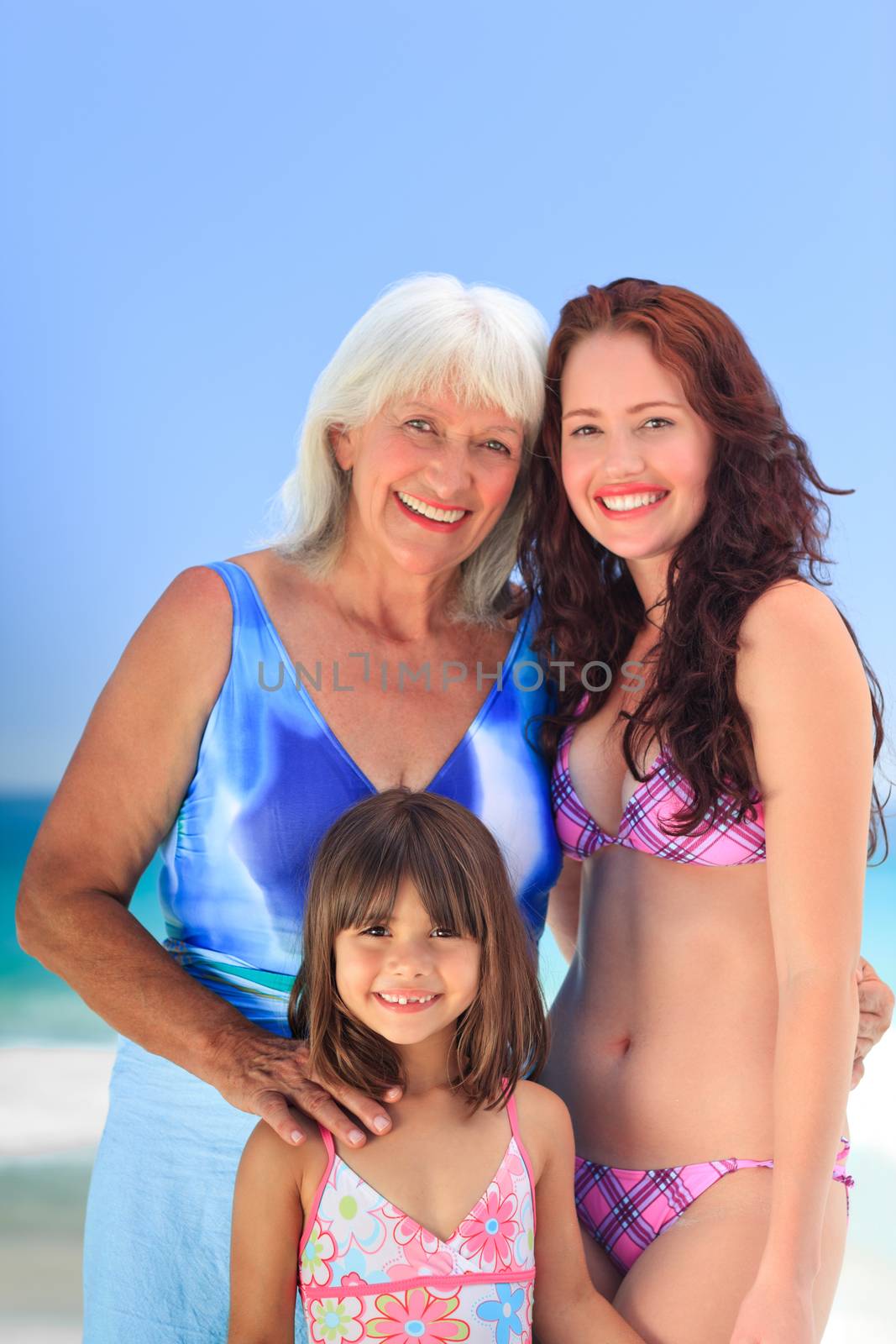 Portrait of a family at the beach by Wavebreakmedia