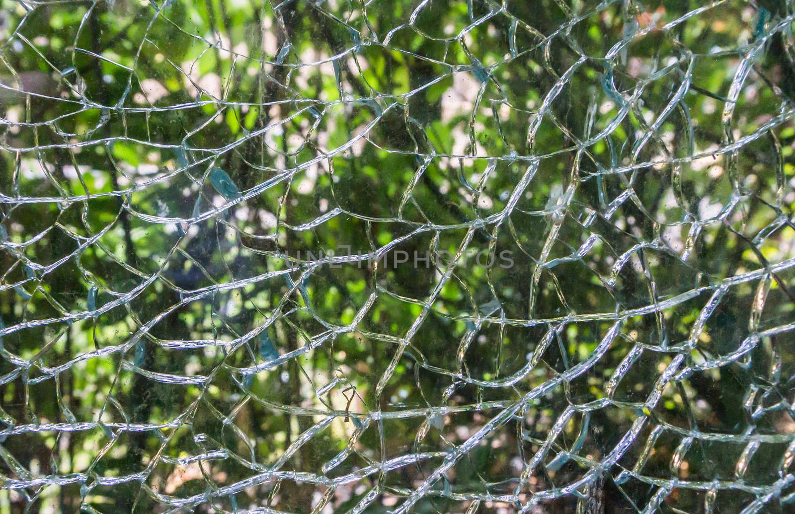 damaged glass window completely shattered in fragments beautiful macro closeup background texture by charlottebleijenberg