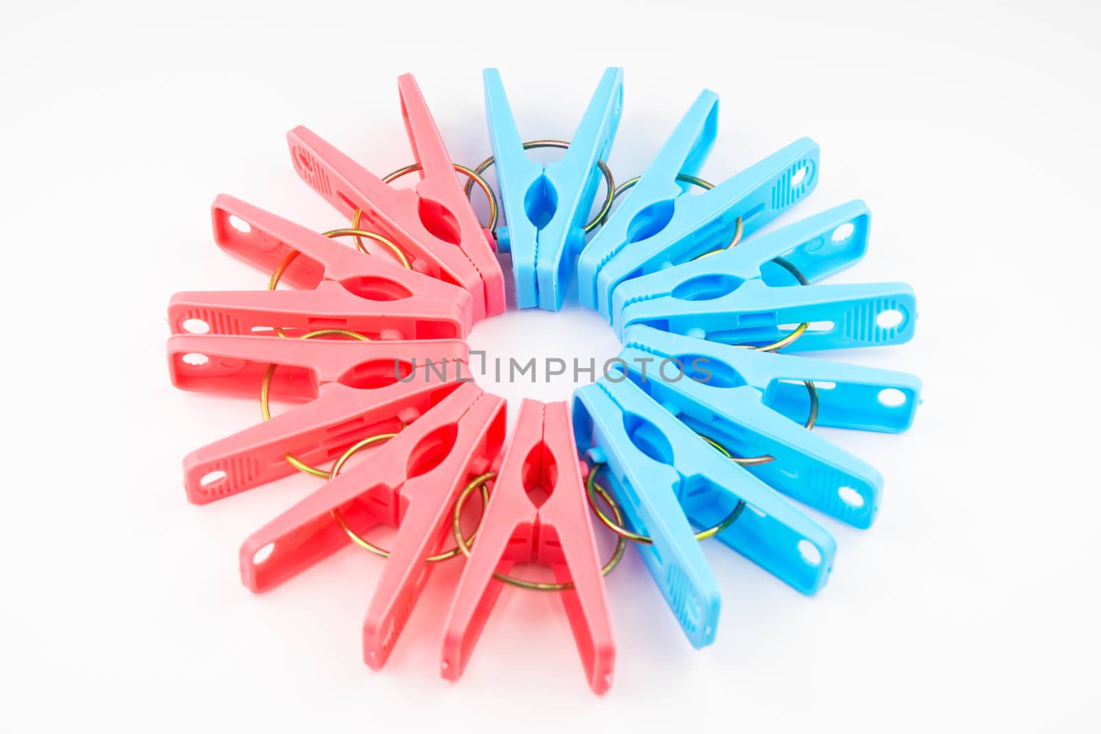 Clothespin clips on isolated white background
