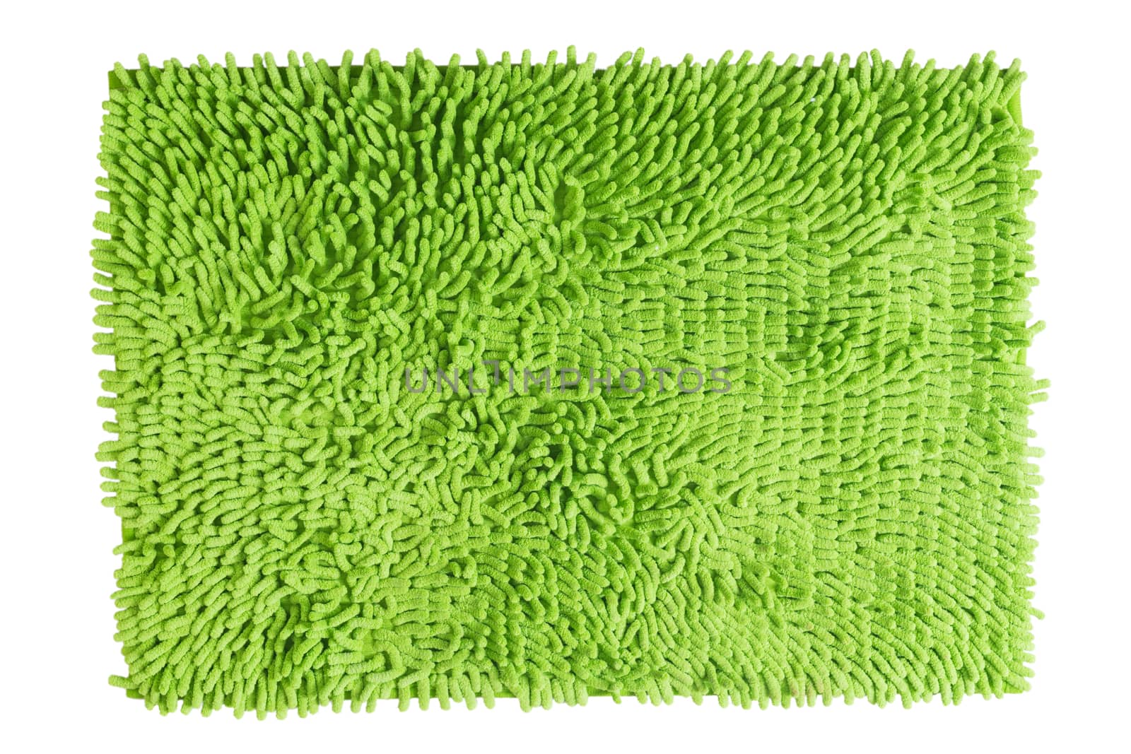 Men foot with shoe on green doormat