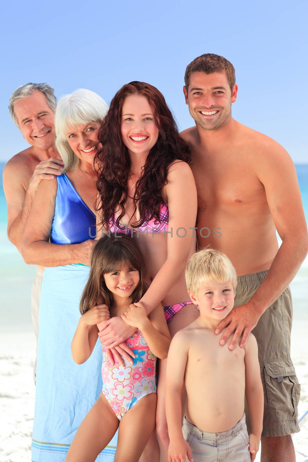 Portrait of a joyful family at the beach