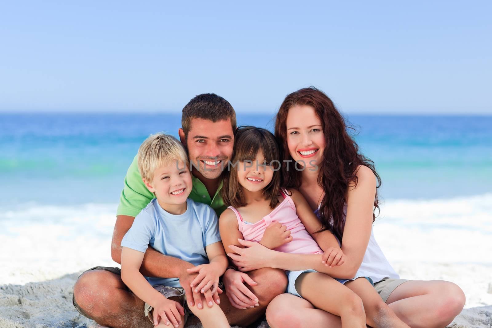 Portrait of a family at the beach