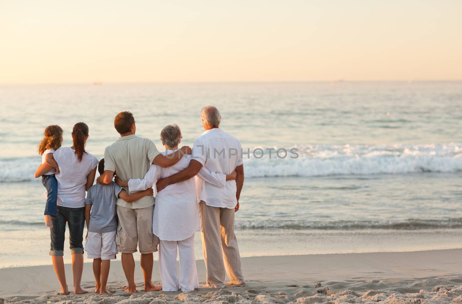 Beautiful family at the beach by Wavebreakmedia