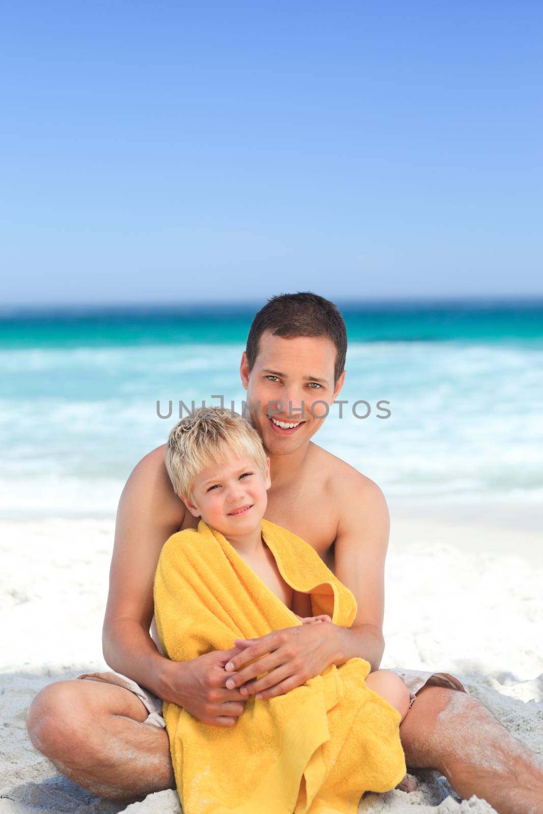 Father with his son in his towel