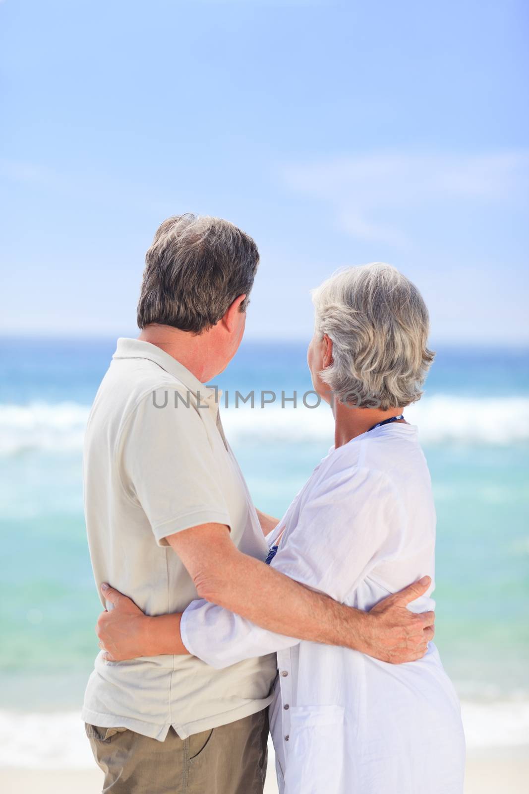 Elderly man embracing her wife