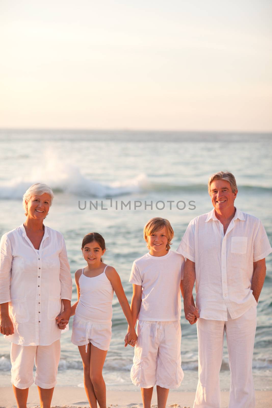 Portrait of a family beside the sea