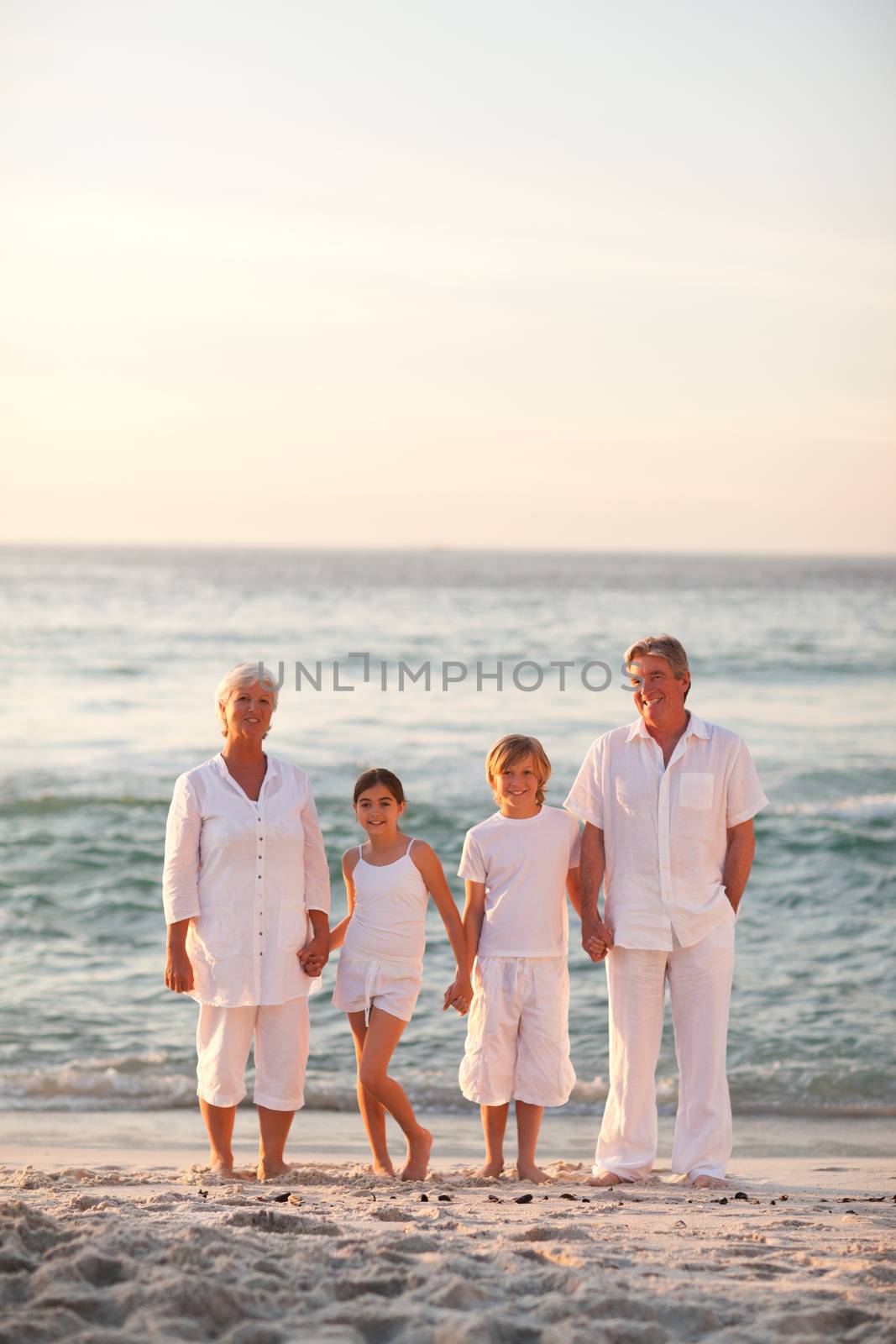 Portrait of a family beside the sea