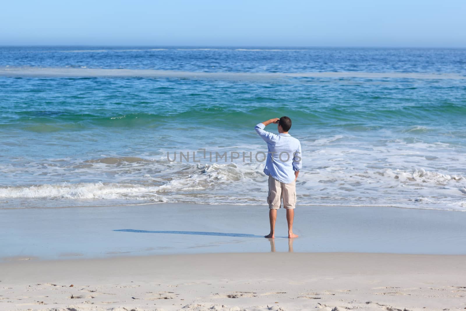 Man looking at the sea by Wavebreakmedia