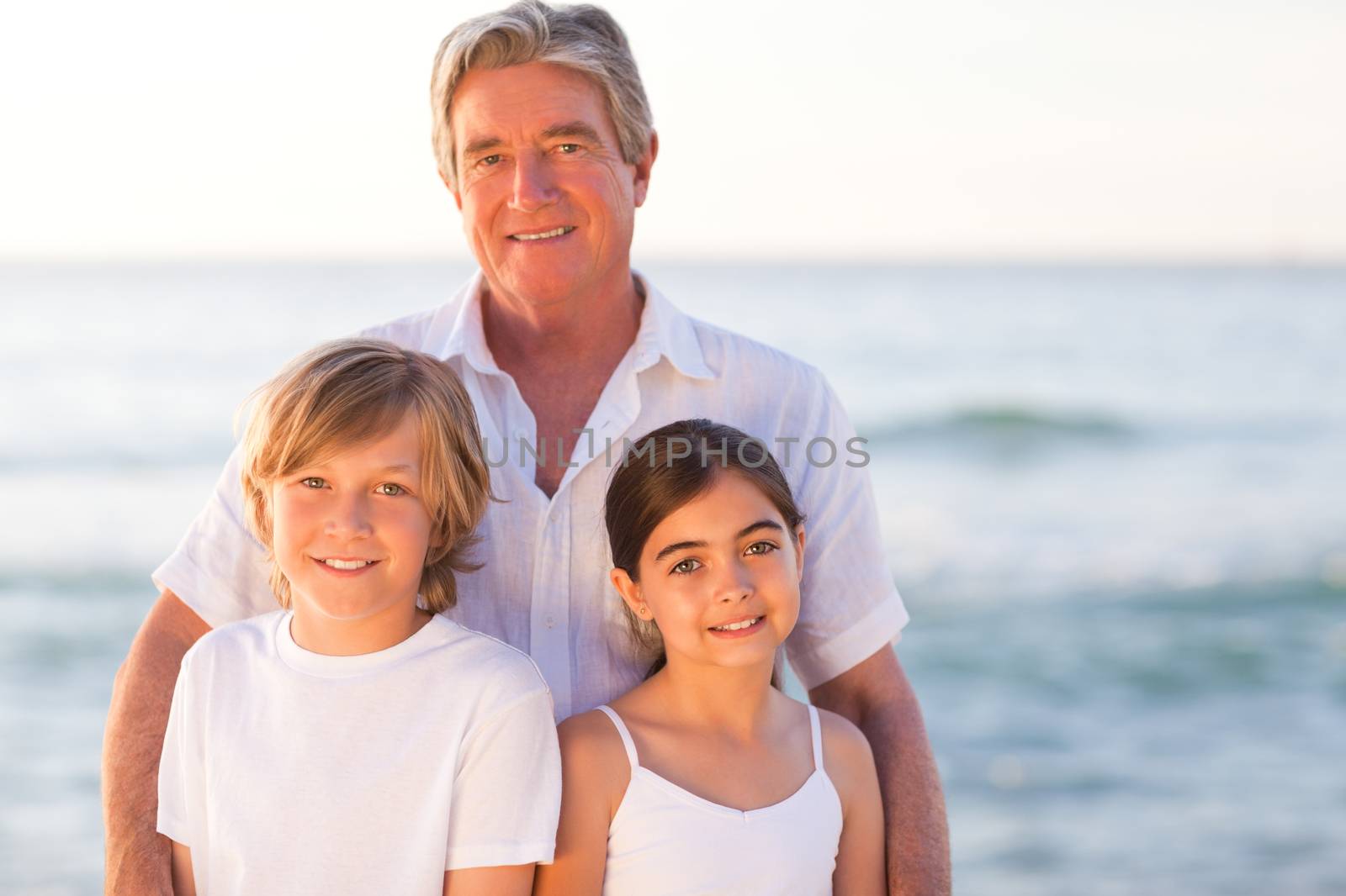 Portrait of a Grandfather with their grandchildren