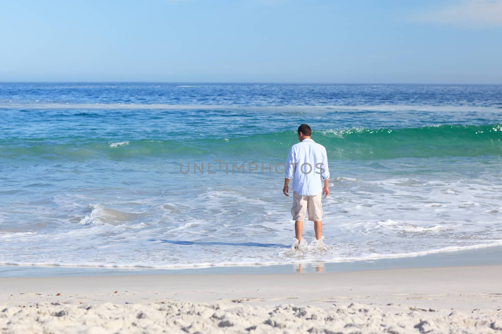 Man looking at the sea by Wavebreakmedia