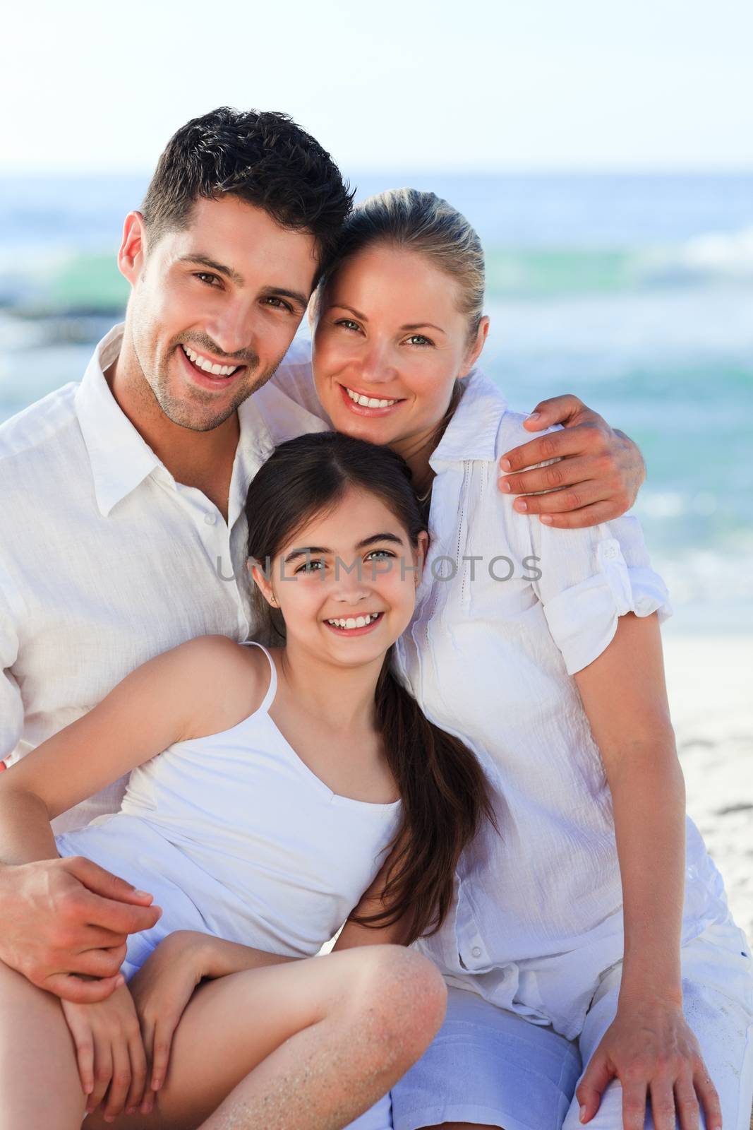 Lovely girl with her parents by Wavebreakmedia