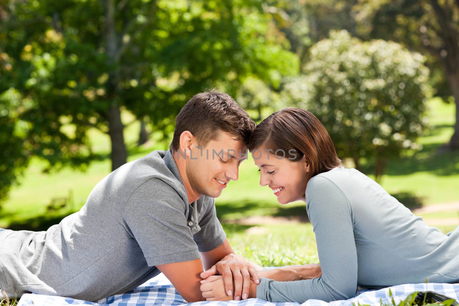 Couple in the park during the summer