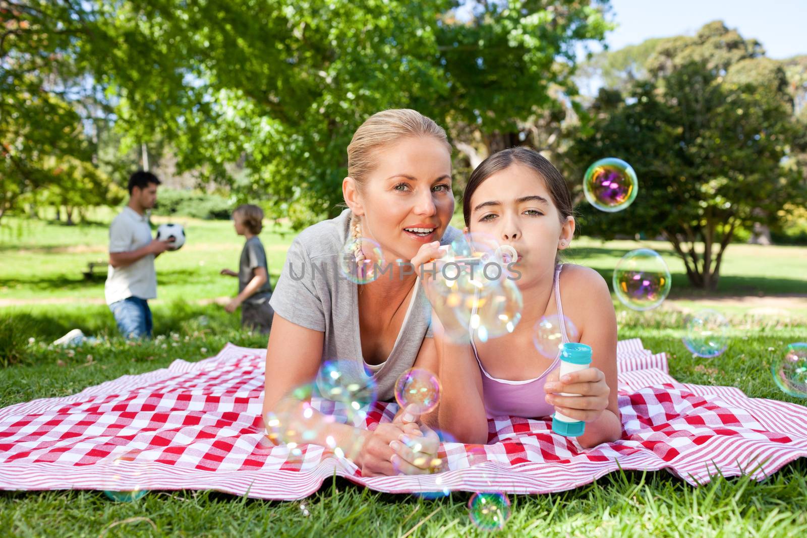 Mother and daughter having fun during the summer