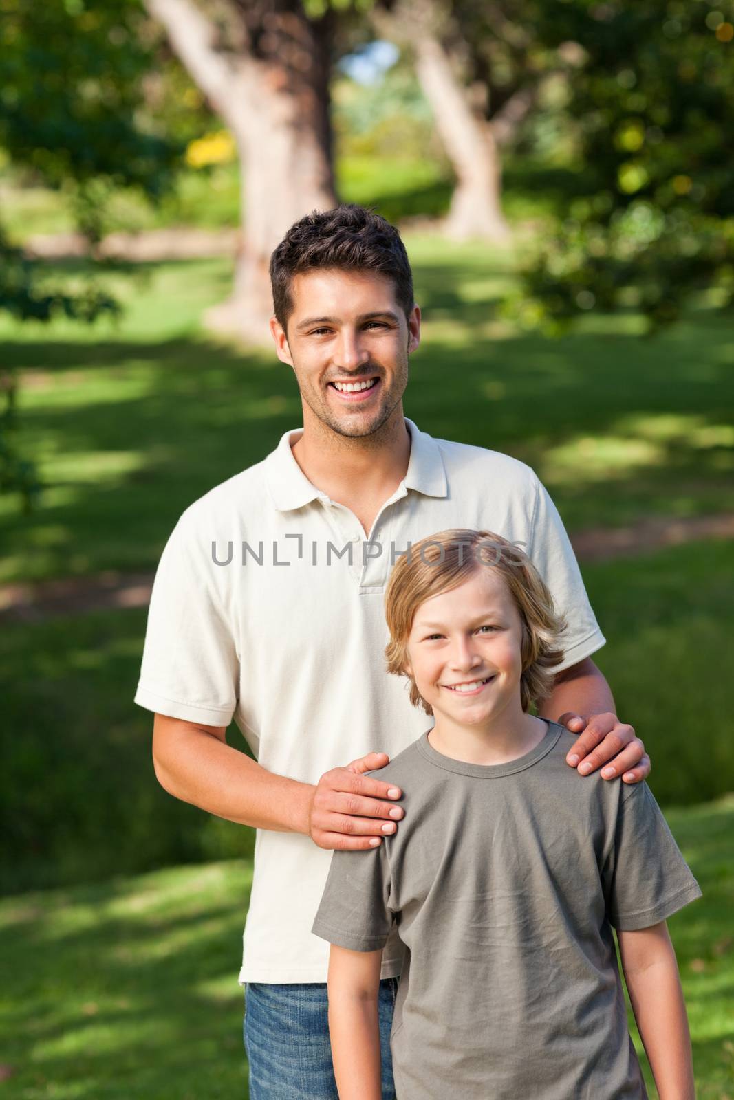 Son and his father in the park by Wavebreakmedia