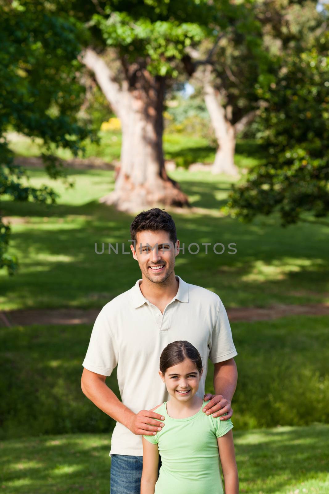 Daughter with her father in the park by Wavebreakmedia