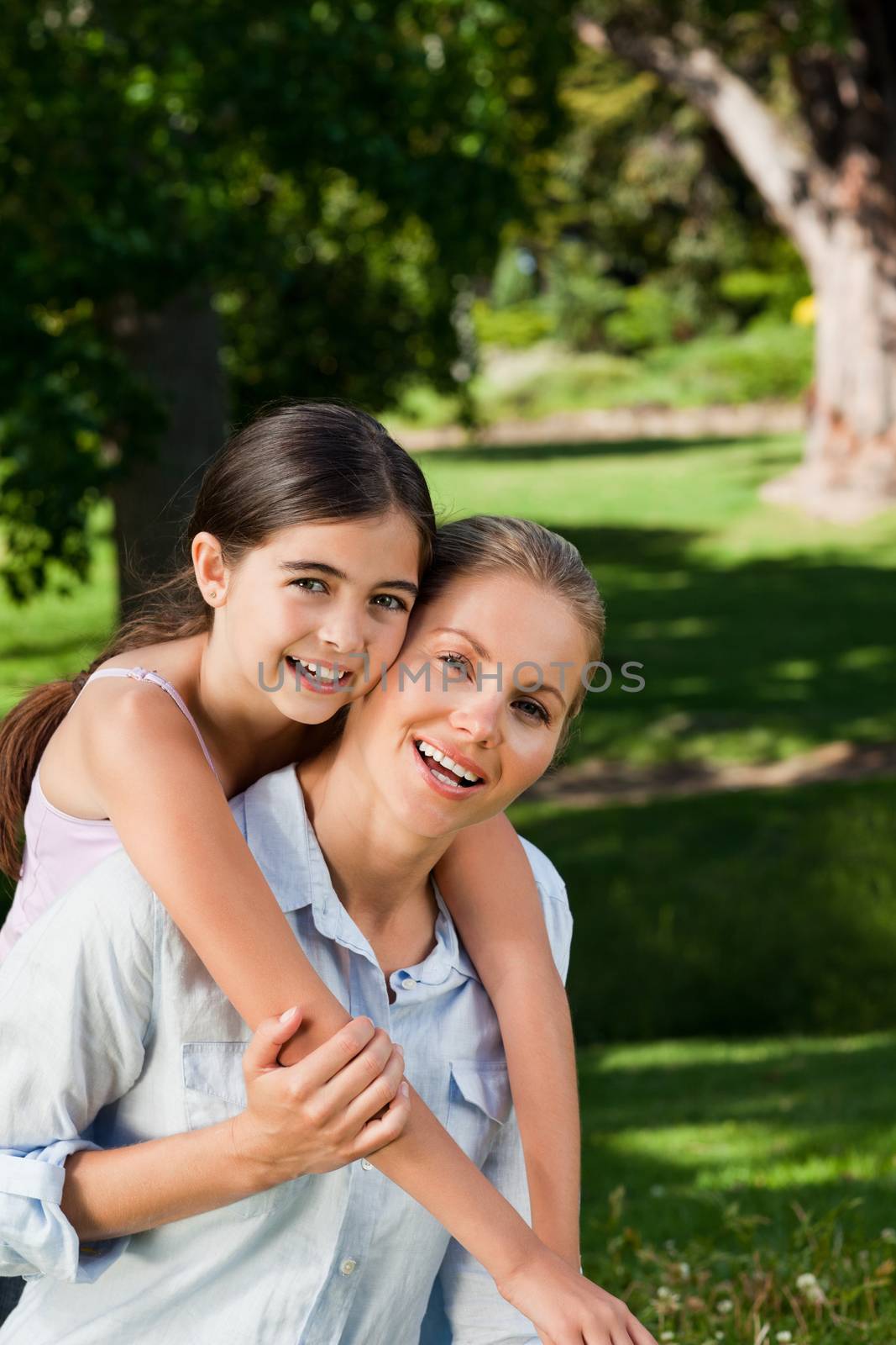 Cute daughter with her mother in the park by Wavebreakmedia