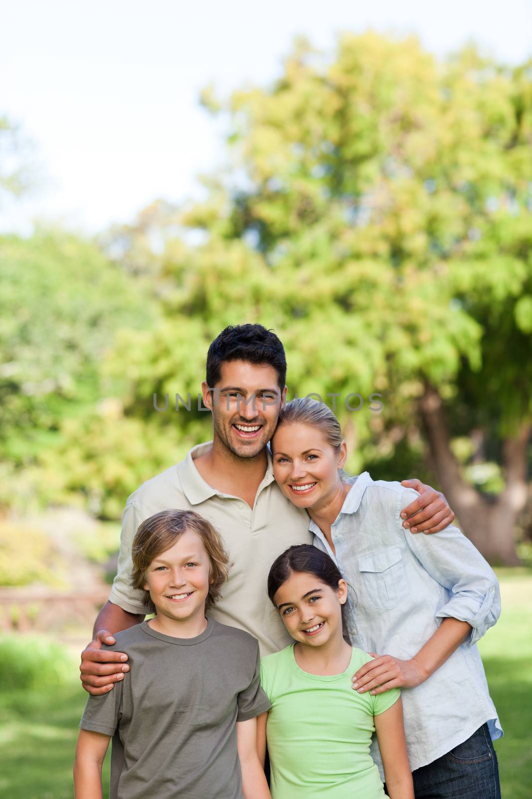 Happy family during the summer in the park 