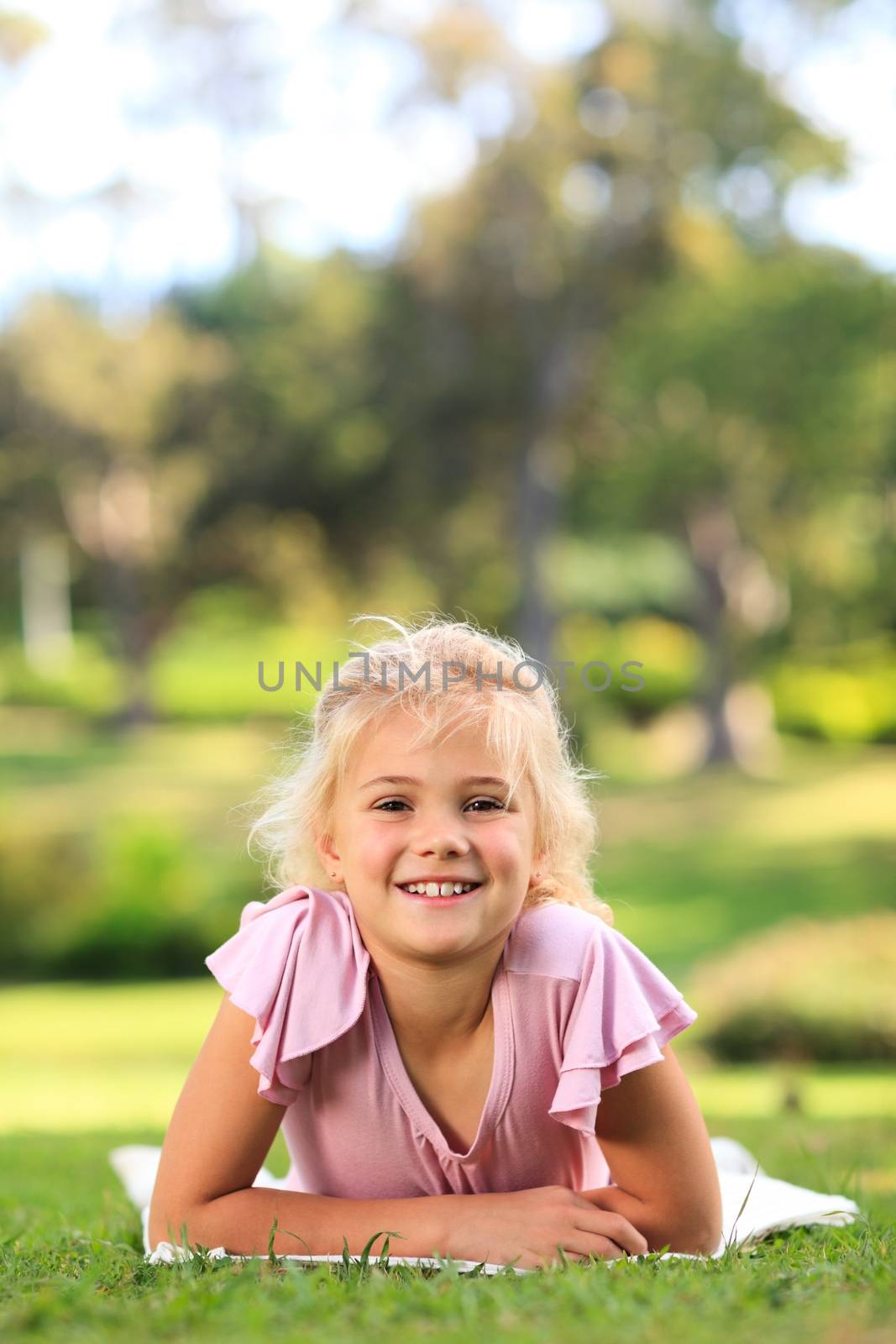 Little girl during the summer in the park