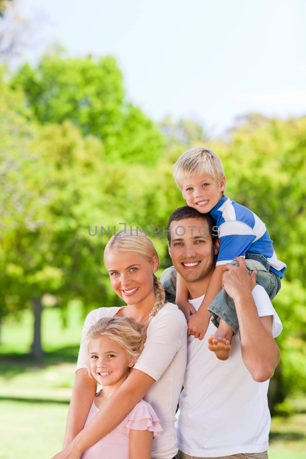 Happy family in the park by Wavebreakmedia