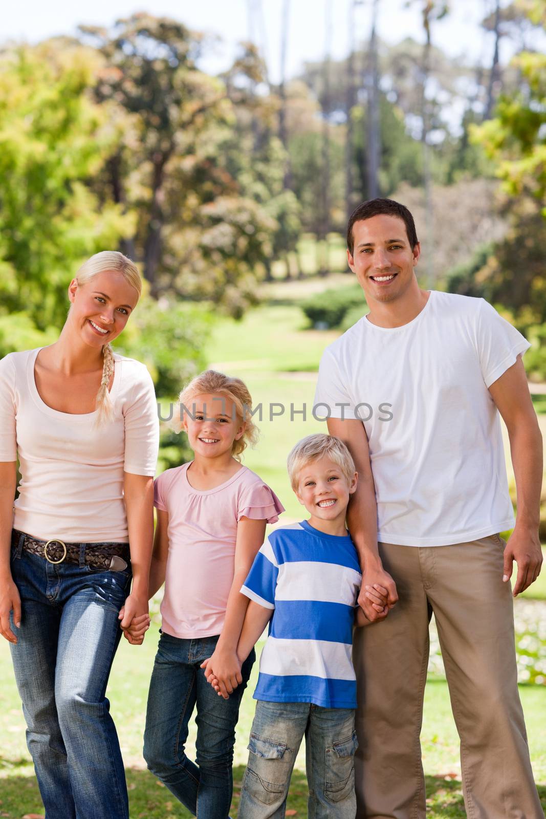 Adorable family in the park by Wavebreakmedia