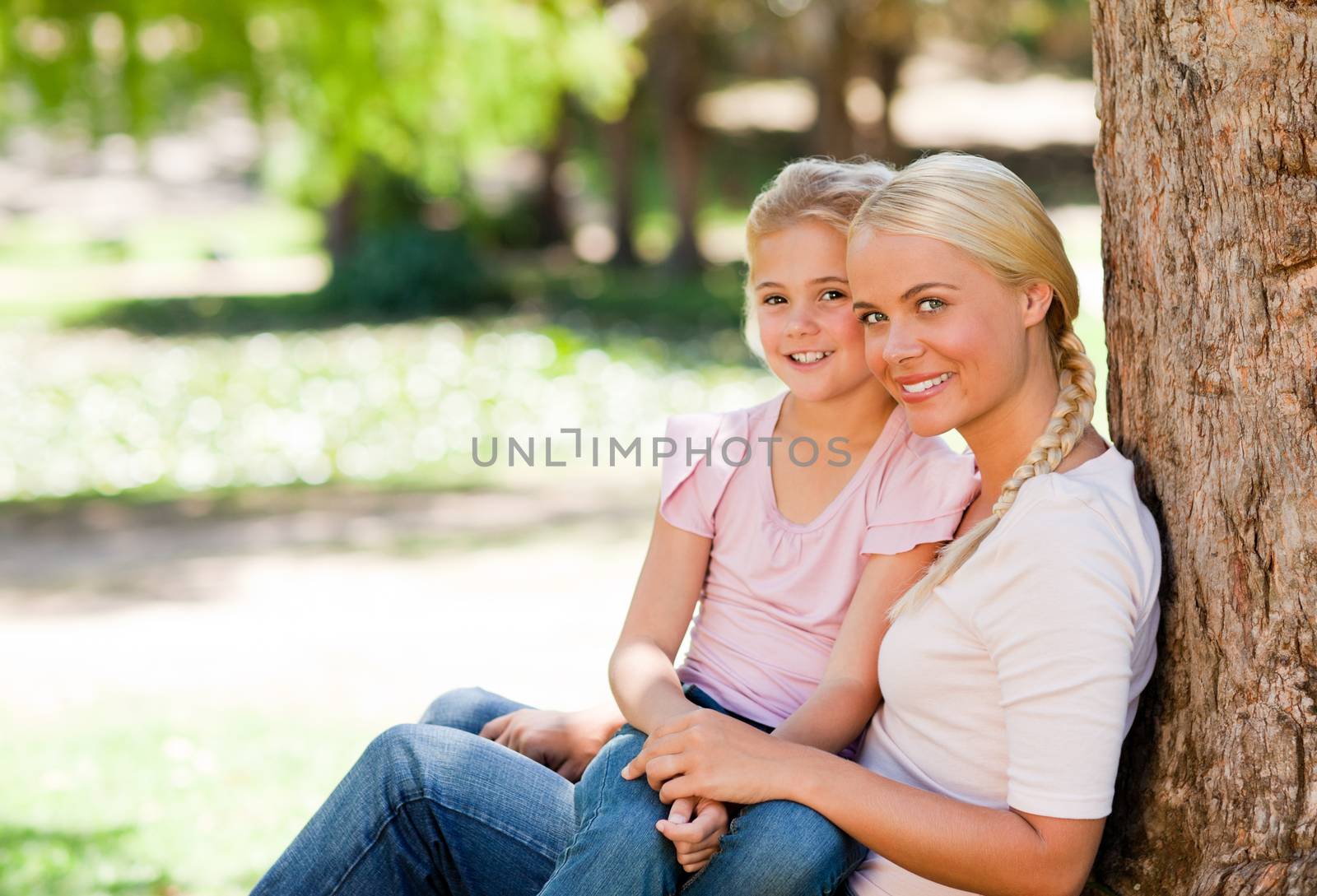 Lovely mother with her daughter in a park
