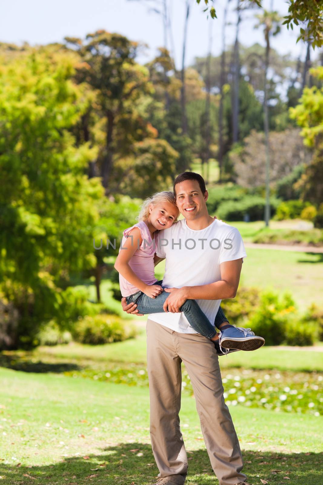 Father with her daughter in the park by Wavebreakmedia