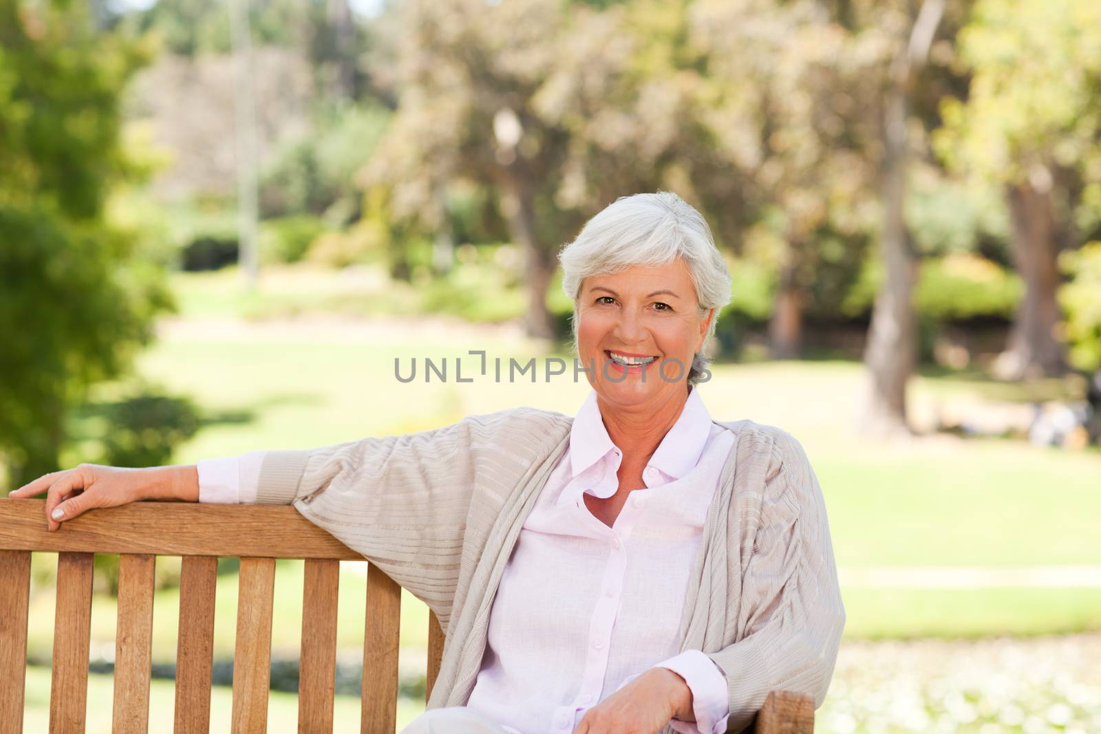 Senior woman on a bench by Wavebreakmedia