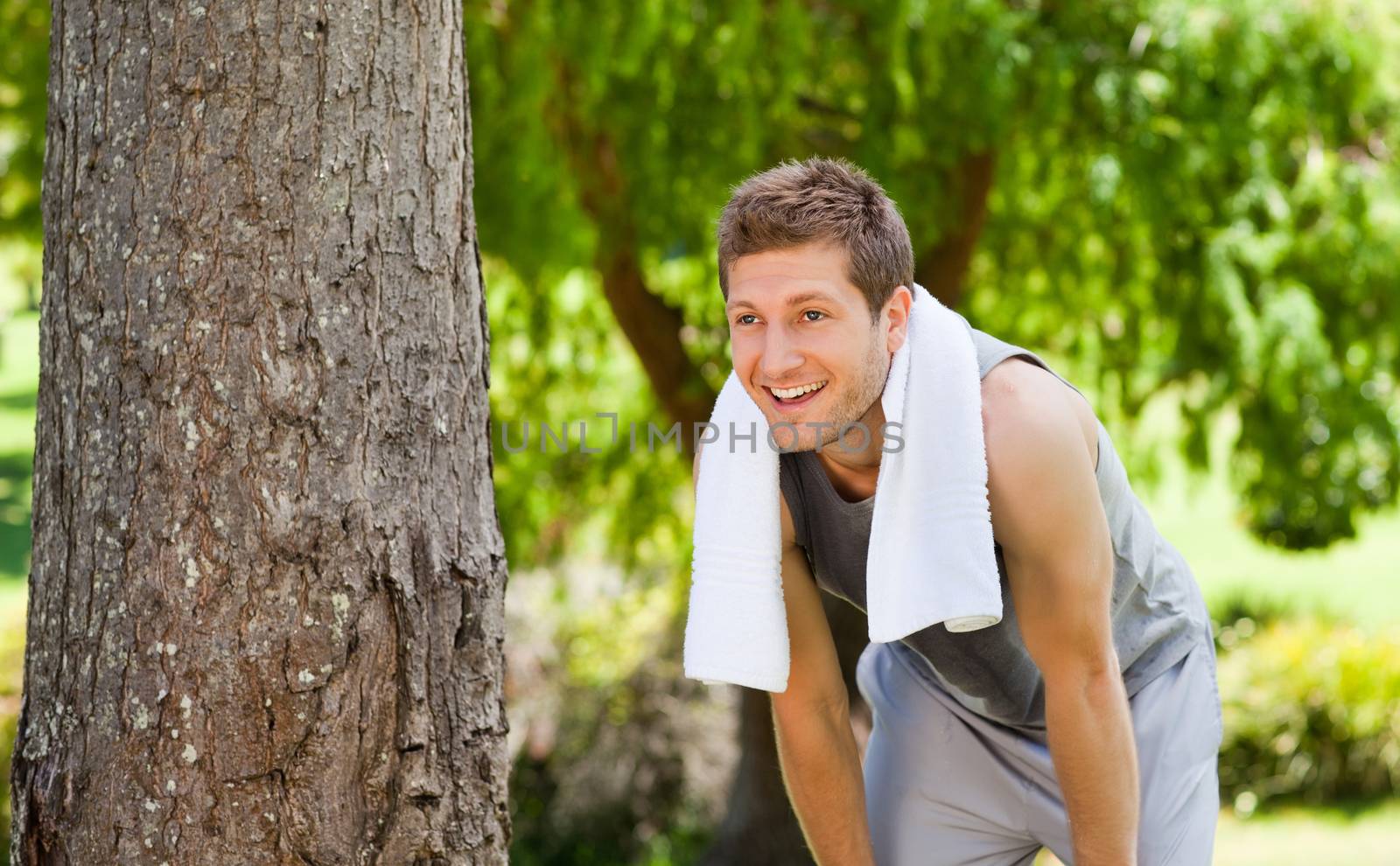 Man exhausted after the gym during the summer