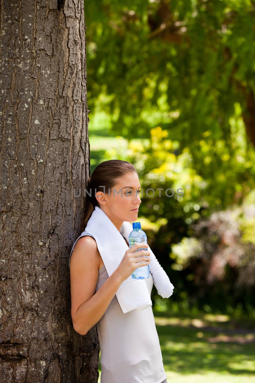 Young woman drinking water  by Wavebreakmedia