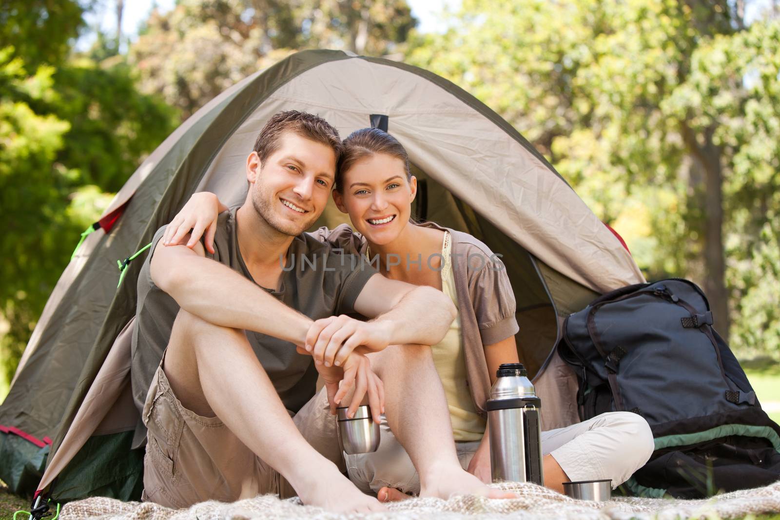 Couple camping in the park by Wavebreakmedia