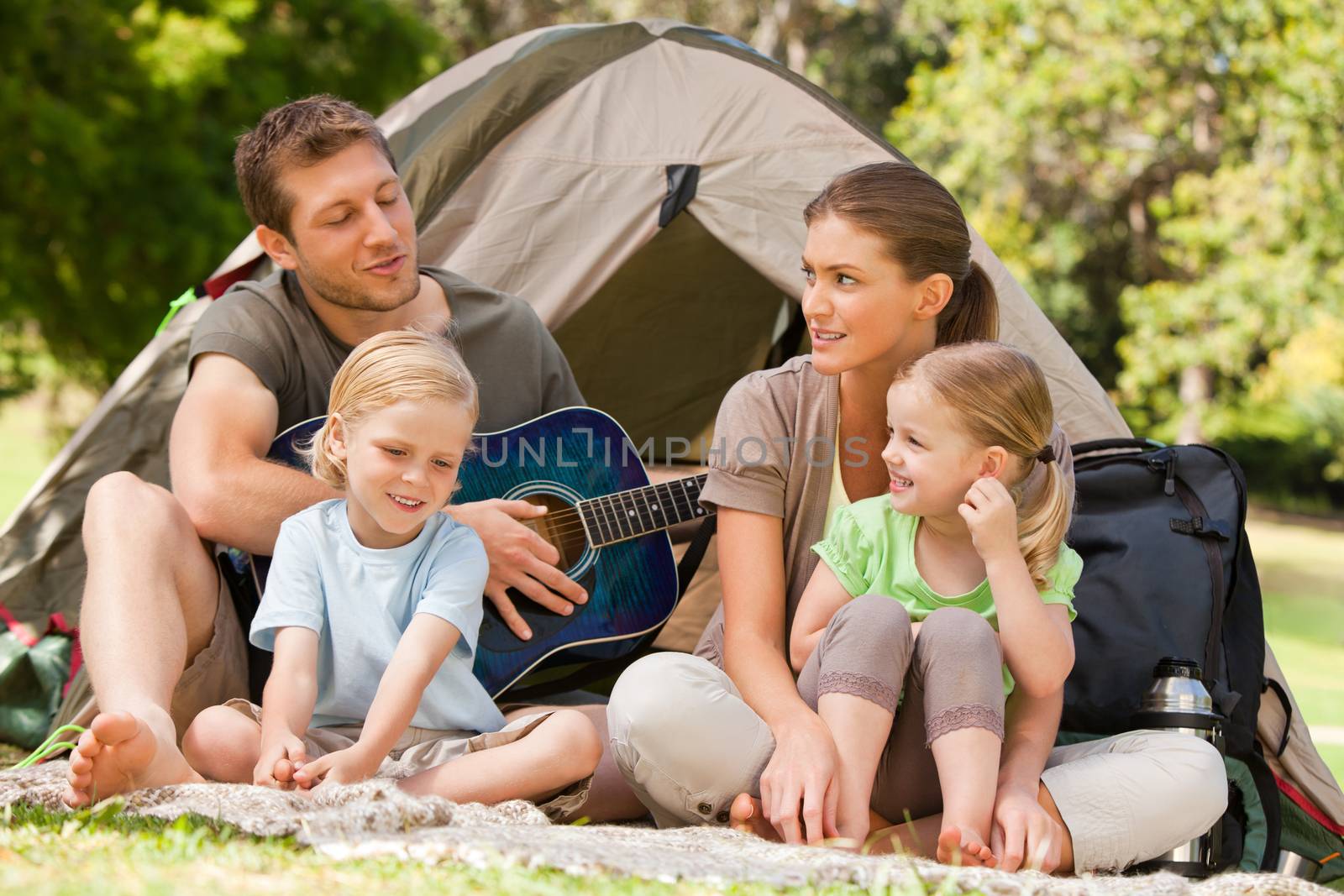 Family camping in the park during the summer