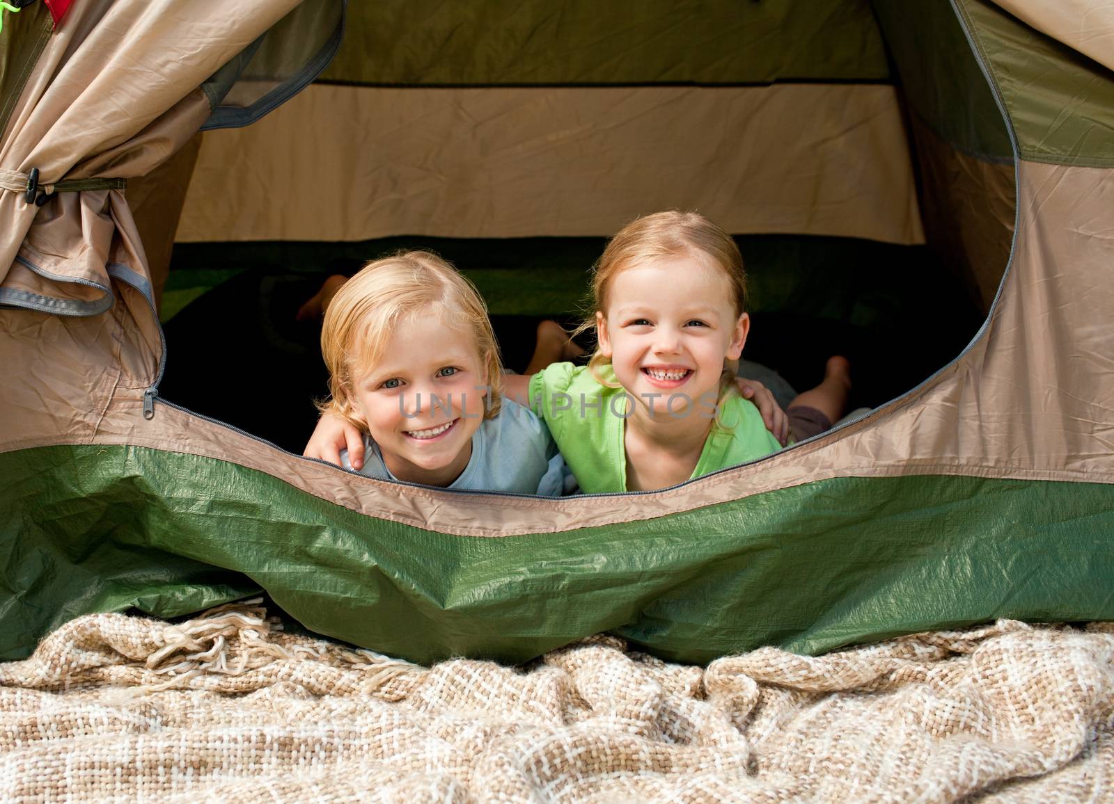 Children camping in the park during the summer
