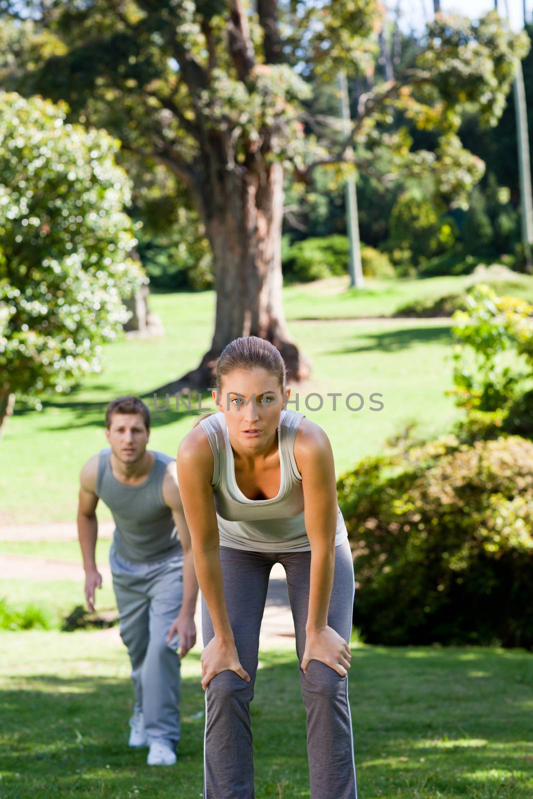 Sporty lovers in the park during the summer