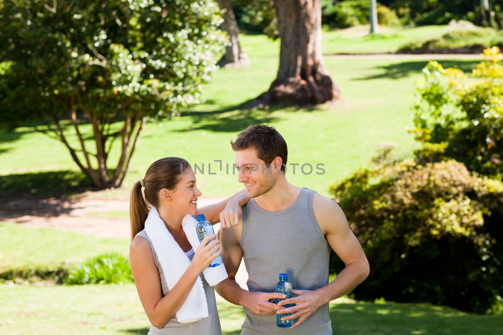 Sporty lovers in the park during the summer