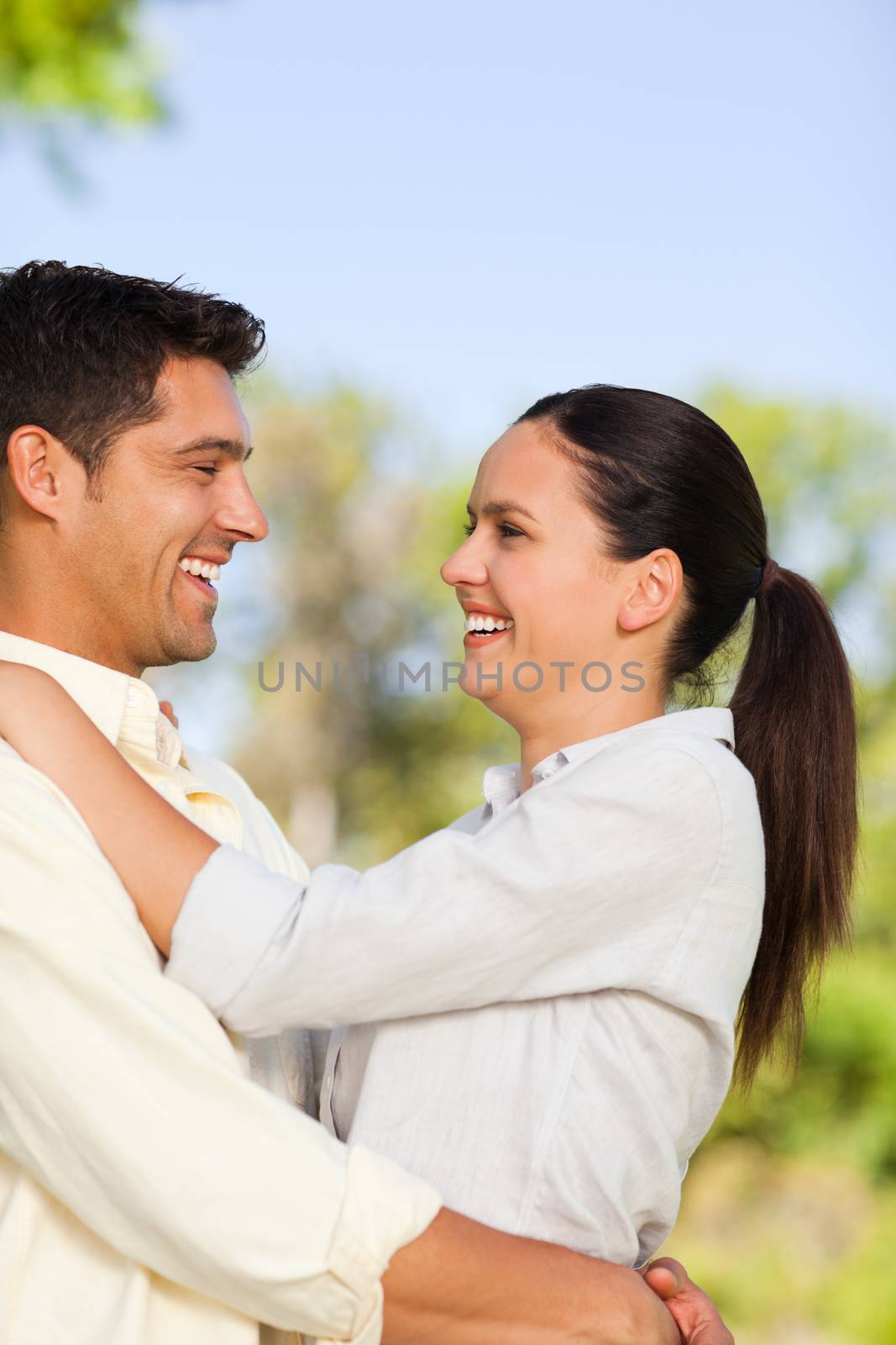 Lovely couple in the park during the summer