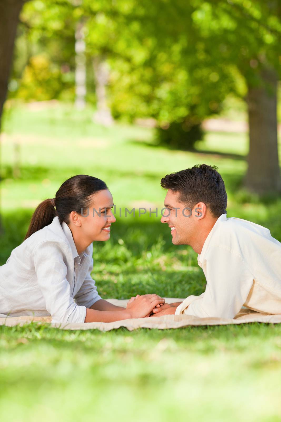 Lovely couple in the park during the summer