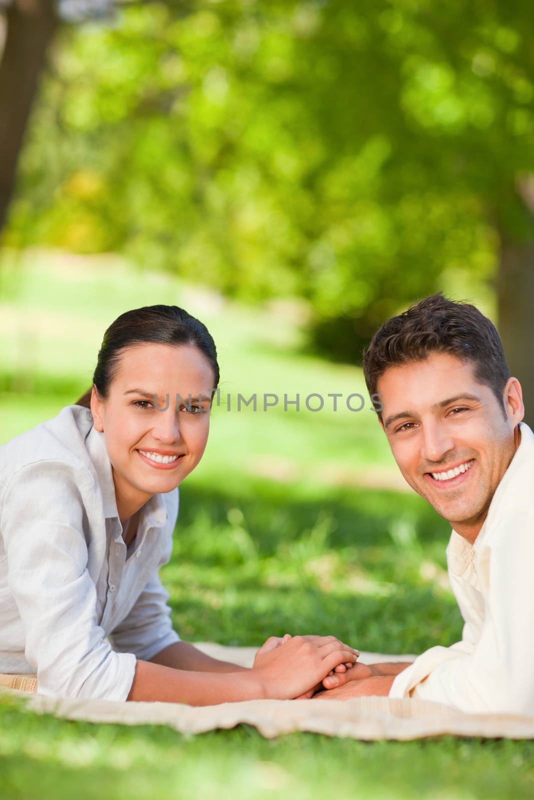 Lovely couple in the park during the summer