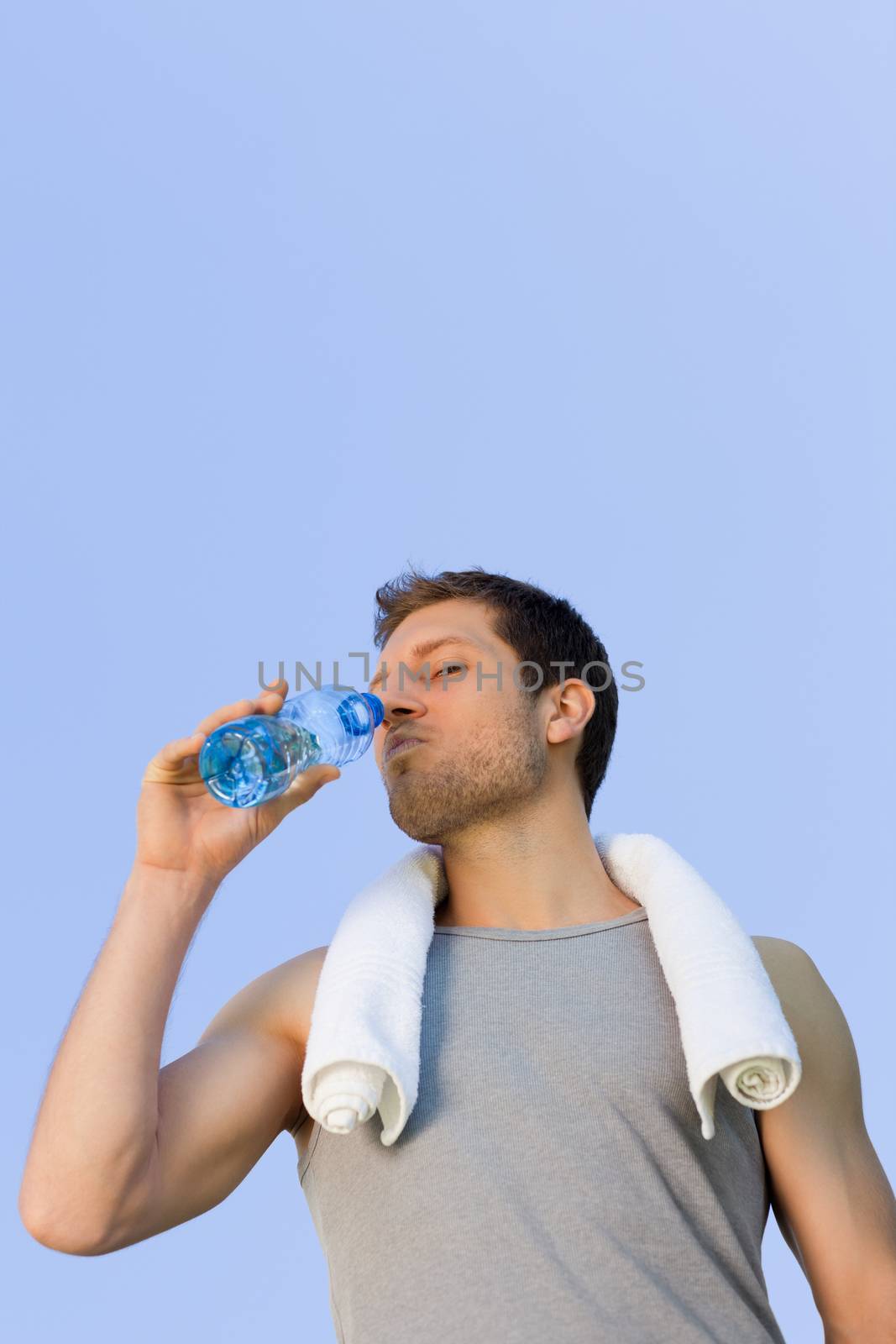 Man drinking water after the gym by Wavebreakmedia