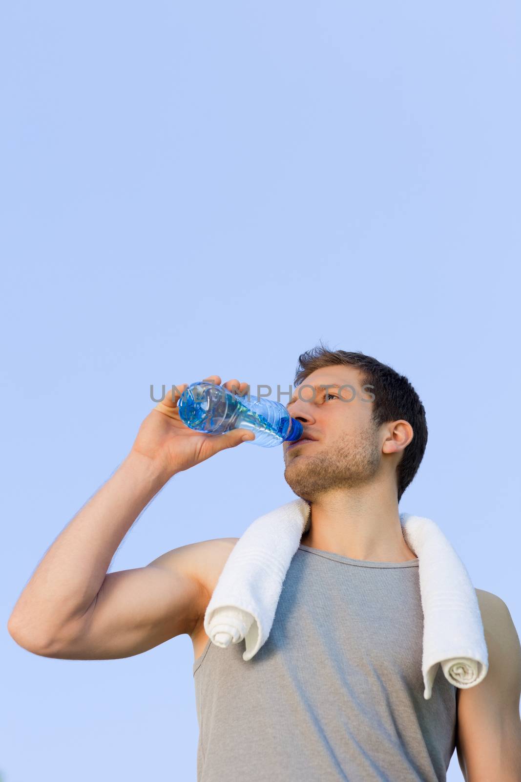 Man drinking water after the gym by Wavebreakmedia