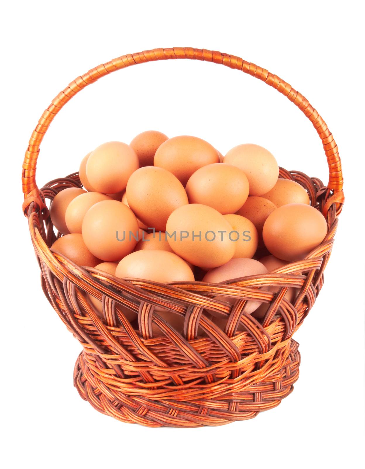 Eggs in basket isolated on a white background