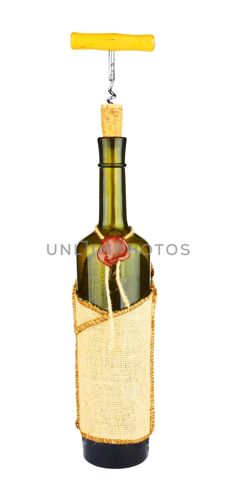 Corkscrew on a wine bottle. Isolated on white
