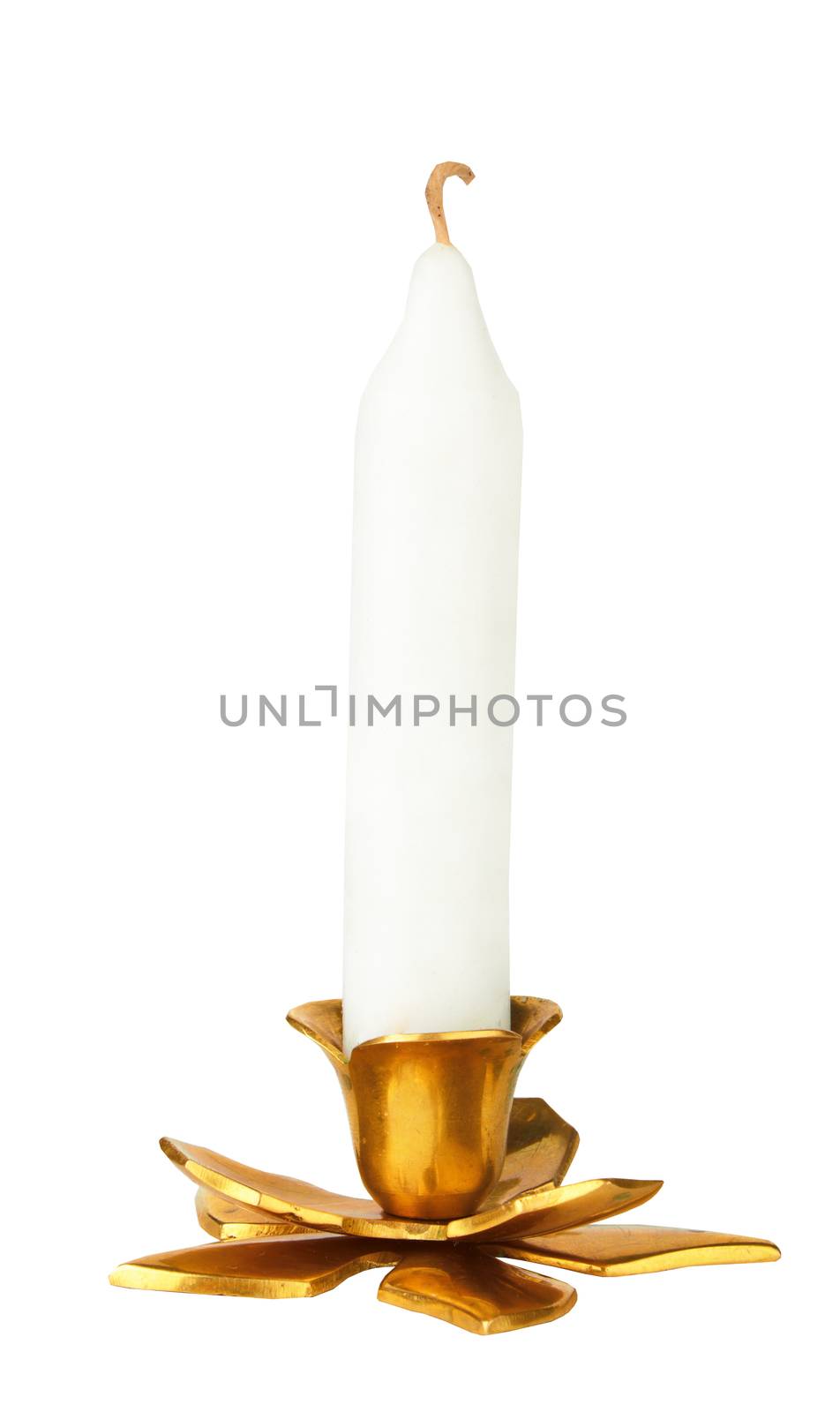 Candle in brass candlestick isolated on white background
