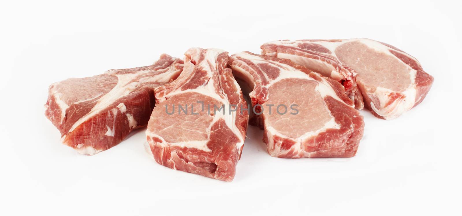 meat raw pork cutlet on a white background 