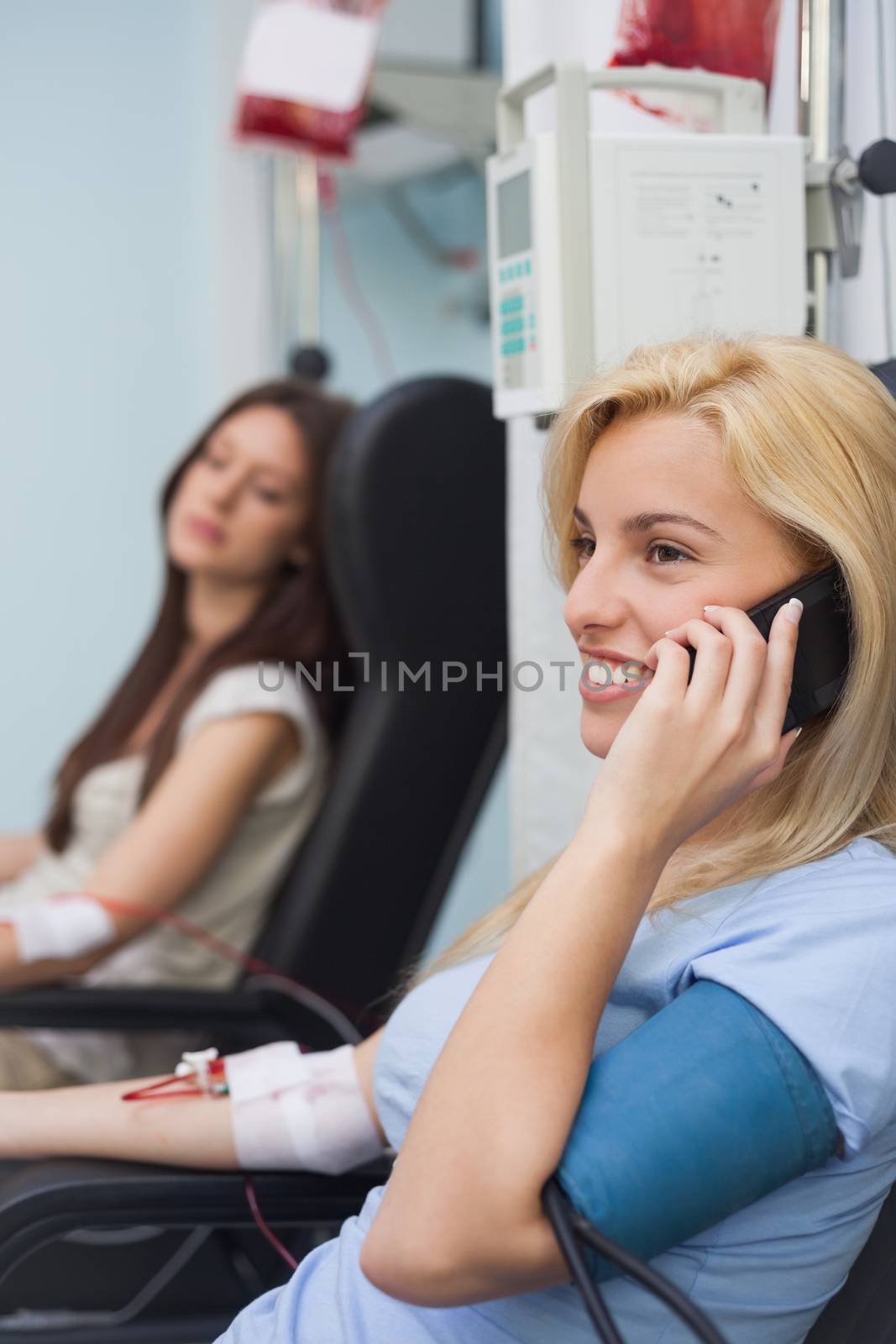 Female patient receiving a blood transfusion by Wavebreakmedia